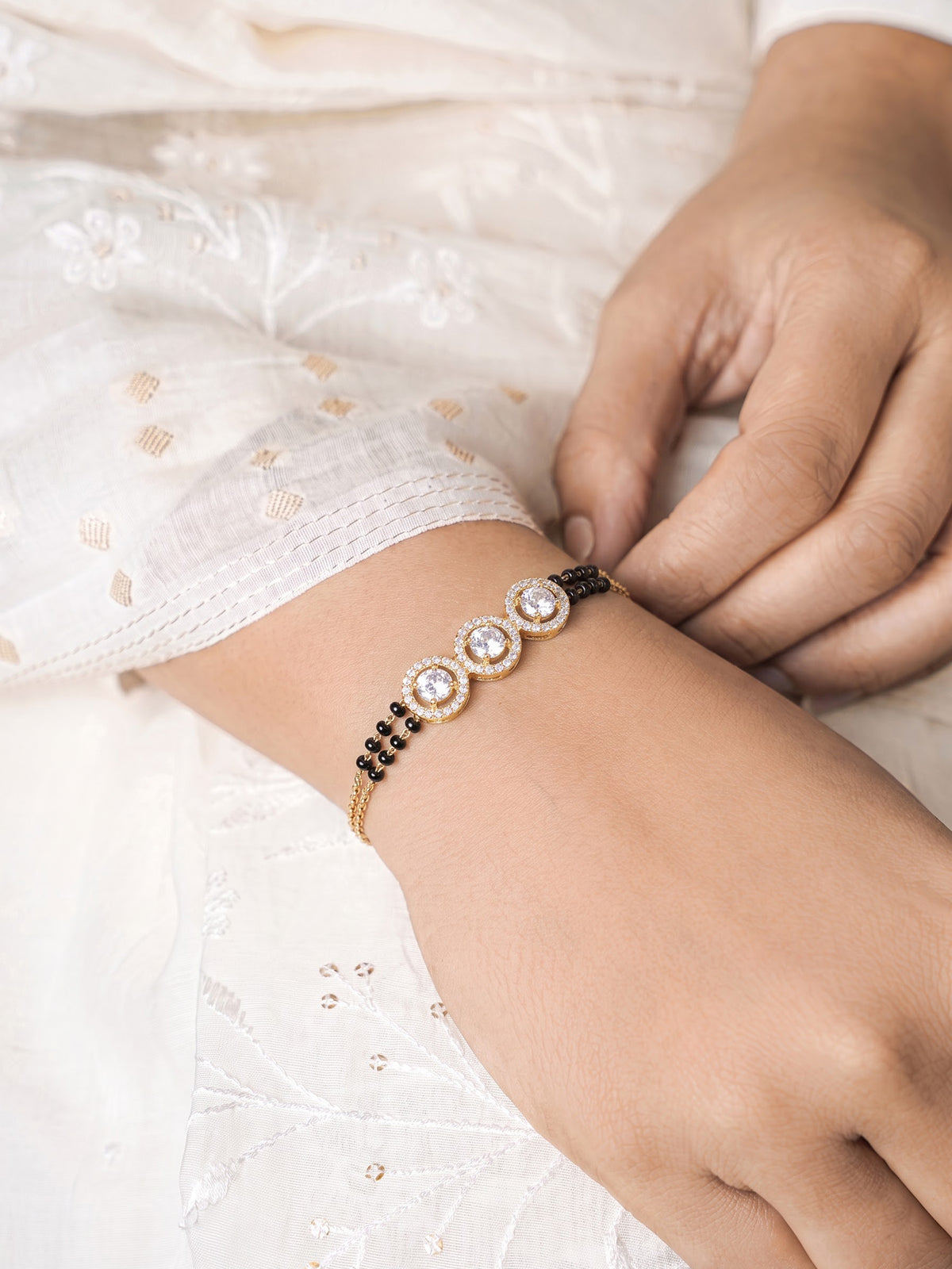 Raivika Diamond Three Solitaire 18K Gold Plated Women's Mangalsutra Bracelet