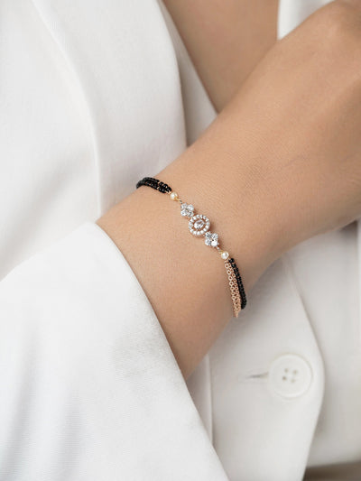 Sakhi Sparkling Diamonds Flower Charm Double Layered Rosegold Plated Mangalsutra Bracelet